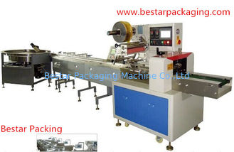 Horizontal flow pack with automatic revolving feeder